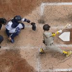 
              San Diego Padres' Jake Cronenworth hits an RBI single during the fifth inning of a baseball game against the Milwaukee Brewers Sunday, June 5, 2022, in Milwaukee. (AP Photo/Morry Gash)
            