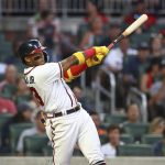 
              Atlanta Braves outfielder Ronald Acuna hits a 2-run homer to take a 7-6 lead over the San Francisco Giants during the fourth inning of a baseball game on Tuesday, June 21, 2022, in Atlanta. (Curtis Compton Atlanta Journal-Constitution via AP)
            