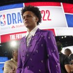 
              Paolo Banchero walks the floor before the start of the the NBA basketball draft, Thursday, June 23, 2022, in New York. Banchero was selected first overall by the Orlando Magic. (AP Photo/John Minchillo)
            