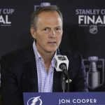 
              Tampa Bay Lightning head coach Jon Cooper speaks during an NHL hockey media day before Game 1 of the Stanley Cup Finals Tuesday, June 14, 2022, in Denver. (AP Photo/David Zalubowski)
            