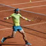 
              Spain's Rafael Nadal volleys the ball to Norway's Casper Ruud during their final match of the French Open tennis tournament at the Roland Garros stadium Sunday, June 5, 2022 in Paris. (AP Photo/Jean-Francois Badias)
            