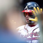 
              Atlanta Braves' William Contreras high-fives teammates in the dugout after a solo home run in the second inning of a baseball game against the Pittsburgh Pirates, Sunday, June 12, 2022, in Atlanta. (AP Photo/Hakim Wright Sr.)
            