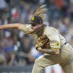 
              San Diego Padres relief pitcher Mike Clevinger works in the fifth inning of a baseball game against the Colorado Rockies, Friday, June 17, 2022, in Denver. (AP Photo/David Zalubowski)
            