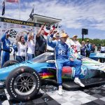 
              Josef Newgarden reacts after winning the Sonsio Grand Prix, Sunday, June 12, 2022, in Elkhart Lake, Wis. (AP Photo/Morry Gash)
            
