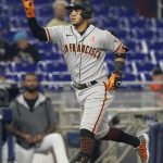 
              San Francisco Giants Thairo Estrada gestures after hitting a two-run-home-run during the fifth inning of a baseball game against the Miami Marlins, Friday, June 3, 2022, in Miami. (AP Photo/Marta Lavandier)
            