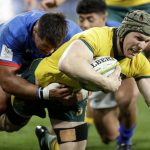 
              FILE - Australia's David Pocock, right, is tackled by Samoa's Jordan Lay during their rugby union test match in Sydney on Sept. 7, 2019. Election officials confirmed, Tuesday June 14, 2022 that former Wallaby Pocock has been elected as an independent senator in Australia. (AP Photo/Rick Rycroft, File)
            