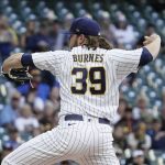 
              Milwaukee Brewers starting pitcher Corbin Burnes throws during the first inning of a baseball game against the San Diego Padres Friday, June 3, 2022, in Milwaukee. (AP Photo/Morry Gash)
            