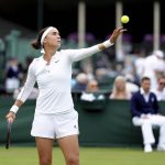 
              Ukraine's Anhelina Kalinina in action against Hungary's Anna Bondar  during a women's singles first round match on day one of the Wimbledon tennis championships in London, Monday, June 27, 2022. (John Walton/PA via AP)
            