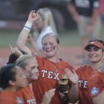 
              THIS CORRECTS THE PLAYERS NAME TO JJ SMITH AND NOT ALYSSA WASHINGTON AS ORIGINALLY SENT - Texas' JJ Smith, centrt, celebrates after her team defeated Oklahoma State in an NCAA softball Women's College World Series game on Monday, June 6, 2022, in Oklahoma City. (AP Photo/Alonzo Adams)
            