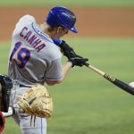 
              New York Mets' Mark Canha (19) grounds out to score Starling Marte during the fourth inning of a baseball game against the Miami Marlins, Saturday, June 25, 2022, in Miami. (AP Photo/Lynne Sladky)
            