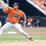 
              Oklahoma State pitcher Dillon Marsh delivers against Missouri State during an NCAA college baseball tournament regional game Sunday, June 5, 2022, in Stillwater, Okla. (Ian Maule/Tulsa World via AP)
            