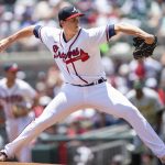 
              Atlanta Braves starting pitcher Kyle Wright throws in the first inning of a baseball game against the Pittsburgh Pirates, Sunday, June 12, 2022, in Atlanta. (AP Photo/Hakim Wright Sr.)
            