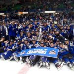 
              The Saint John Sea Dogs pose for a team photo after defeating the Hamilton Bulldogs in the Memorial Cup hockey final, Wednesday, June 29, 2022, in Saint John, New Brunswick. (Ron Ward/The Canadian Press via AP)
            