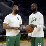 
              Boston Celtics guard Jaylen Brown, right, speaks with coach Ime Udoka during NBA basketball practice in San Francisco, Wednesday, June 1, 2022. The Golden State Warriors are scheduled to host the Celtics in Game 1 of the NBA Finals on Thursday. (AP Photo/Jed Jacobsohn)
            