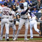 
              Houston Astros' Kyle Tucker (30) celebrates with Yordan Alvarez (44) andAlex Bregman (2), as New York Mets catcher James McCann waits after Tucker hits a three-run home run during the first inning of a baseball game Tuesday, June 28, 2022, in New York. (AP Photo/Jessie Alcheh)
            