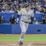 
              New York Yankees' Anthony Rizzo heads to first after hitting a grand slam against the Toronto Blue Jays during the fifth inning of a baseball game Friday, June 17, 2022, in Toronto. (Christopher Katsarov/The Canadian Press via AP)
            