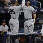 
              New York Yankees' Aaron Judge, left, celebrates with Giancarlo Stanton after hitting a home run against the Tampa Bay Rays during the seventh inning of a baseball game Wednesday, June 22, 2022, in St. Petersburg, Fla. (AP Photo/Scott Audette)
            