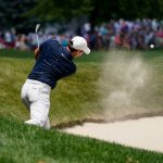 
              Rory McIlroy, of Northern Ireland, shoots out of the bunker on the fourth hole during the second round of the Travelers Championship golf tournament at TPC River Highlands, Friday, June 24, 2022, in Cromwell, Conn. (AP Photo/Seth Wenig)
            