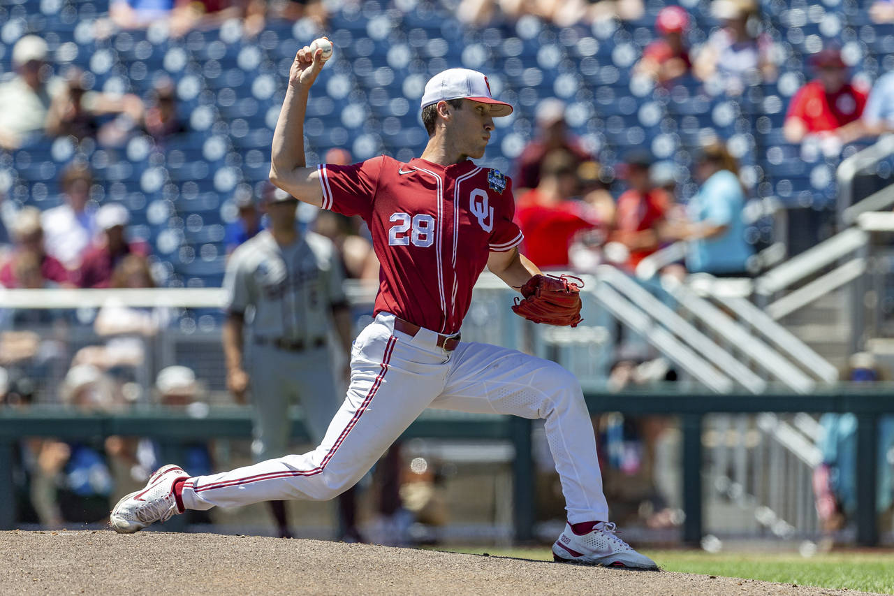 Oklahoma starting pitcher David Sandlin (28) throws a pitch against Texas A&M in the first inning d...