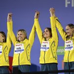 
              Silver medalist team of Australia celebrate after the Women 4x200m Freestyle Relay final at the 19th FINA World Championships in Budapest, Hungary, Wednesday, June 22, 2022. (AP Photo/Anna Szilagyi)
            