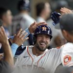 
              Houston Astros' J.J. Matijevic celebrates with teammates in the dugout after hitting a home run against the Chicago White Sox during the fourth inning of a baseball game Sunday, June 19, 2022, in Houston. Matijevic's home run was his first Major League hit. (AP Photo/David J. Phillip)
            