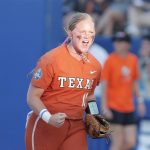 
              THIS CORRECTS THE PLAYERS NAME TO JJ SMITH AND NOT ALYSSA WASHINGTON AS ORIGINALLY SENT -Texas' JJ Smith celebrates after her team defeated Oklahoma State during an NCAA softball Women's College World Series game on Monday, June 6, 2022, in Oklahoma City. (AP Photo/Alonzo Adams)
            