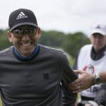 
              Sergio Garcia of Spain smiles as he walks off the driving range just prior to the start of the first round of the inaugural LIV Golf Invitational at the Centurion Club in St Albans, England, Thursday, June 9, 2022. (AP Photo/Alastair Grant)
            