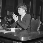 
              FILE - First Lady Eleanor Roosevelt, Assistant Director of Civilian Defense, testifies in Washington D.C. on Jan. 14, 1942, before the Tolan Special House Committee studying migratory worker problems in connection with the defense program. The arrival of Title IX and its protections for American women was a long time coming and the result of hard work from the likes of Jeannette Rankin, Shirley Chisholm, Eleanor Roosevelt, Patsy Mink and more.(AP Photo/File)
            