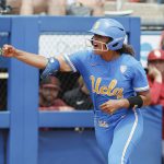 
              UCLA's Maya Brady (7) celebrates after a home run during the third inning of an NCAA softball Women's College World Series game against Oklahoma on Monday, June 6, 2022, in Oklahoma City. (AP Photo/Alonzo Adams)
            