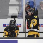 
              Hamilton Bulldogs' Jan Mysak, left, and Mark Duarte react on the bench after the team's loss to the Shawinigan Cataractes in a Memorial Cup hockey game Thursday, June 23, 2022, in Saint John, New Brunswick. (Darren Calabrese/The Canadian Press via AP)
            