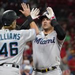 
              Miami Marlins' Avisail Garcia, right, is congratulated by teammate Luke Williams after hitting a two-run home run during the ninth inning of a baseball game against the St. Louis Cardinals Wednesday, June 29, 2022, in St. Louis. (AP Photo/Jeff Roberson)
            
