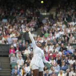
              Serena Williams of the US stretches as she tries to return to France's Harmony Tan in a first round women's singles match on day two of the Wimbledon tennis championships in London, Tuesday, June 28, 2022. (AP Photo/Alberto Pezzali)
            