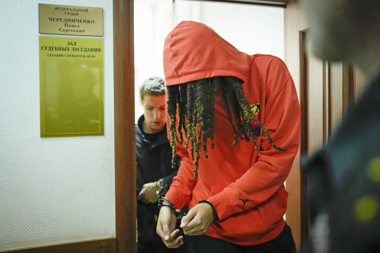 FILE - WNBA star and two-time Olympic gold medalist Brittney Griner leaves a courtroom after a hear...