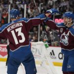 
              Colorado Avalanche right wing Valeri Nichushkin celebrates his goal against the Tampa Bay Lightning with right wing Mikko Rantanen during the second period in Game 2 of the NHL hockey Stanley Cup Final, Saturday, June 18, 2022, in Denver. (AP Photo/John Locher)
            