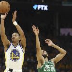 
              CORRECTS TO GAME 2 INSTEAD OF GAME 1 - Golden State Warriors guard Jordan Poole (3) shoots against Boston Celtics guard Derrick White during the second half of Game 2 of basketball's NBA Finals in San Francisco, Sunday, June 5, 2022. (AP Photo/Jed Jacobsohn)
            