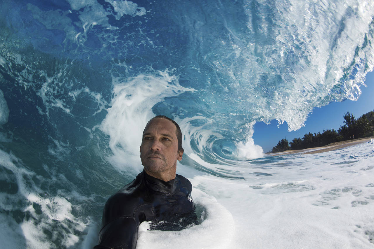 Clark Little takes a selfie as he photographs waves on the North Shore of Oahu near Haleiwa, Hawaii...