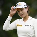 
              In Gee Chun, of South Korea, holds her ball after finishing her round on the ninth hole during the first round in the Women's PGA Championship golf tournament at Congressional Country Club, Thursday, June 23, 2022, in Bethesda, Md. (AP Photo/Nick Wass)
            