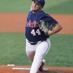 
              Mississippi pitcher Dylan DeLucia (44) pitches against Southern Mississippi in the fourth inning of an NCAA college baseball super regional game against Saturday, June 11, 2022, in Hattiesburg, Miss. (AP Photo/Rogelio V. Solis)
            