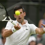 
              Serbia's Novak Djokovic returns to Korea's Kwon Soonwoo in a men's first round singles match on day one of the Wimbledon tennis championships in London, Monday, June 27, 2022. (AP Photo/Kirsty Wigglesworth)
            