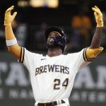 
              Milwaukee Brewers' Andrew McCutchen reacts after hitting an RBI double during the fifth inning of a baseball game against the St. Louis Cardinals Wednesday, June 22, 2022, in Milwaukee. (AP Photo/Morry Gash)
            
