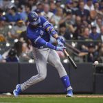 
              Toronto Blue Jays' Lourdes Gurriel Jr. hits a single during the fourth inning of the team's baseball game against the Milwaukee Brewers Friday, June 24, 2022, in Milwaukee. (AP Photo/Kenny Yoo)
            