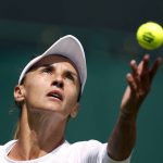 
              Ukraine's Lesia Tsurenko serves to Britain's Jodie Burrage during a women's singles first round match on day one of the Wimbledon tennis championships in London, Monday, June 27, 2022. (Steve Paston/PA via AP)
            