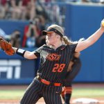 
              Oklahoma State's Kelly Maxwell pitches in the second inning of the team's NCAA softball Women's College World Series game against Florida on Saturday, June 4, 2022, in Oklahoma City. (AP Photo/Alonzo Adams)
            