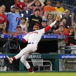 
              Philadelphia Phillies third baseman Johan Camargo catches a pop foul out by San Francisco Giants' Wilmer Flores during the eighth inning of a baseball game, Wednesday, June 1, 2022, in Philadelphia. (AP Photo/Matt Slocum)
            
