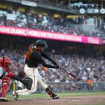 
              San Francisco Giants' Wilmer Flores (41) hits a three-run home run against the Cincinnati Reds during the sixth inning of a baseball game in San Francisco, Saturday, June 25, 2022. (AP Photo/Josie Lepe)
            