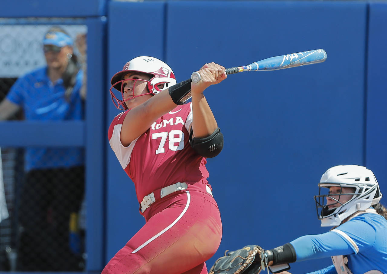 Oklahoma's Jocelyn Alo (78) hits a grand slam during fifth inning of an NCAA softball Women's Colle...