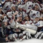 
              The Colorado Avalanche pose with the Stanley Cup after defeating the Tampa Bay Lightning 2-1 in Game 6 of the NHL hockey Stanley Cup Finals on Sunday, June 26, 2022, in Tampa, Fla. (AP Photo/Phelan Ebenhack)
            