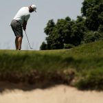 
              Phil Mickelson takes a tee shot on the fifth hole during a practice round ahead of the U.S. Open golf tournament, Tuesday, June 14, 2022, at The Country Club in Brookline, Mass. (AP Photo/Charlie Riedel)
            