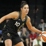 
              Las Vegas Aces' Kelsey Plum (10) drives against the Dallas Wings during the second half of a WNBA basketball game Sunday, June 5, 2022, in Las Vegas. (AP Photo/John Locher)
            