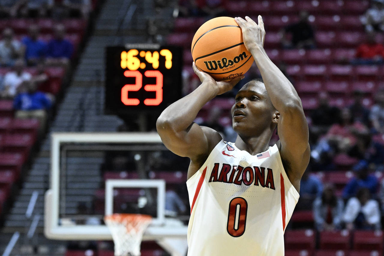 FILE - Arizona guard Bennedict Mathurin (0) shoots against Wright State during the first half of a ...